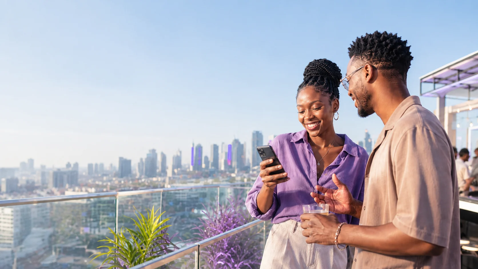 Two friends looking at a phone together